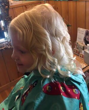 little girl with blond curly hair 